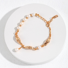 Gold Plated Pearl Bracelet with Sculpted Links