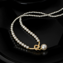 Elegant Drop Pearl Necklace with Refined Center Accent