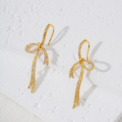 Asymmetrical Bow Earrings with Cubic Zirconia – Elegant Feminine Sparkle