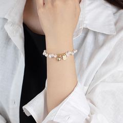Gold-Plated Pearl Charm Bracelet with Heart & Tag Pendants