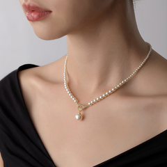Elegant Drop Pearl Necklace with Refined Center Accent