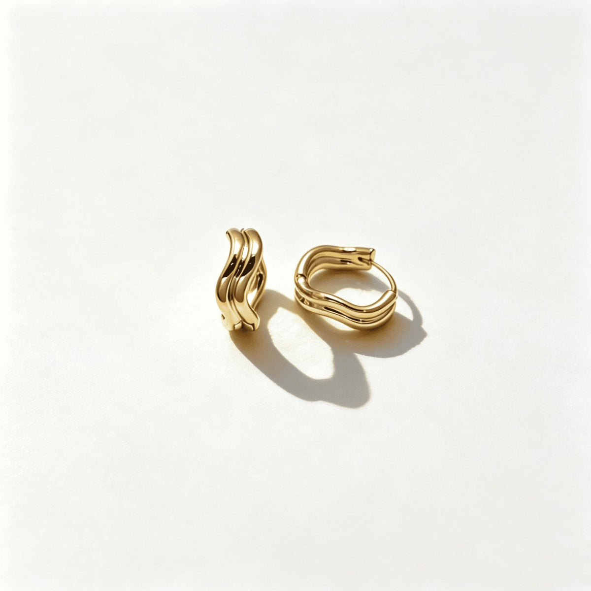 Minimalist High-Polish Hoop Earrings – 14K Gold Plated Sculptural Wave Design